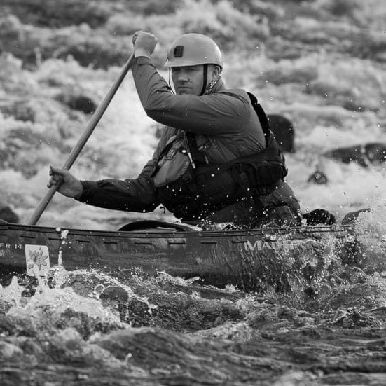 Clive Pearson of Rapier Marketing cruising down a rapid in a kayak